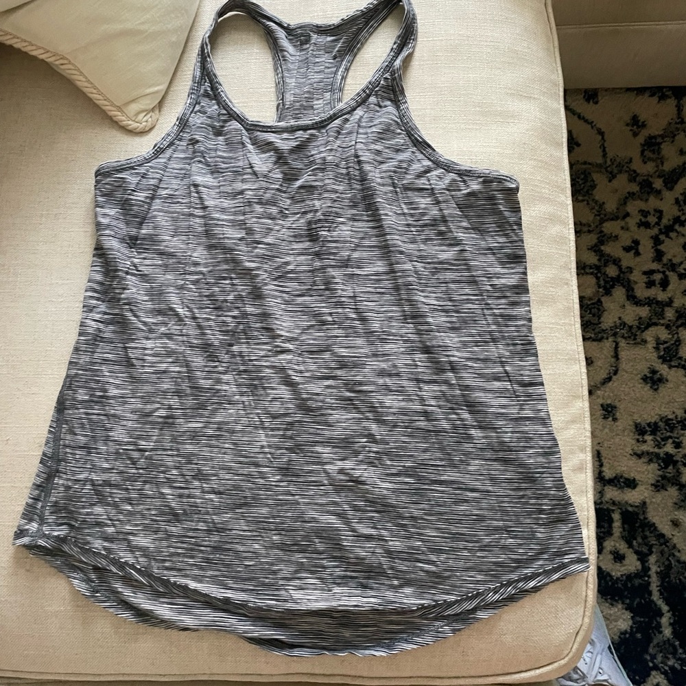 Lululemon women’s Tank too, size 10 or 12, gray/black stripes